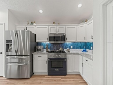 Spacious 3/2 Juniper in Sunset Pointe with Enclosed Lanai on The Links of Spruce Creek in Florida - for sale on GolfHomes.com, golf home, golf lot