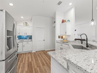 Spacious 3/2 Juniper in Sunset Pointe with Enclosed Lanai on The Links of Spruce Creek in Florida - for sale on GolfHomes.com, golf home, golf lot