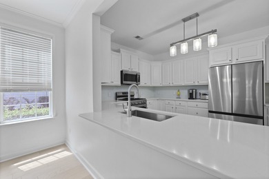 Welcome to 132 Fresh Meadow Lane - An Exceptional End-Unit on Dunes West Golf Club in South Carolina - for sale on GolfHomes.com, golf home, golf lot