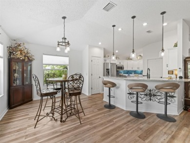 Spacious 3/2 Juniper in Sunset Pointe with Enclosed Lanai on The Links of Spruce Creek in Florida - for sale on GolfHomes.com, golf home, golf lot