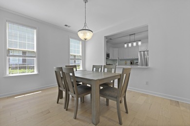 Welcome to 132 Fresh Meadow Lane - An Exceptional End-Unit on Dunes West Golf Club in South Carolina - for sale on GolfHomes.com, golf home, golf lot