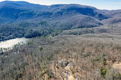 Discover your mountain retreat offering sweeping views of Lake on Lake Toxaway Country Club in North Carolina - for sale on GolfHomes.com, golf home, golf lot
