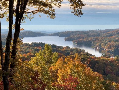 Discover your mountain retreat offering sweeping views of Lake on Lake Toxaway Country Club in North Carolina - for sale on GolfHomes.com, golf home, golf lot
