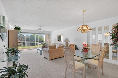 Enjoy beautiful golf course and lake views from this spacious on Glen Eagle Golf and Country Club in Florida - for sale on GolfHomes.com, golf home, golf lot