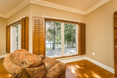 Experience the pinnacle of lakefront luxury in this furnished on  in Arkansas - for sale on GolfHomes.com, golf home, golf lot