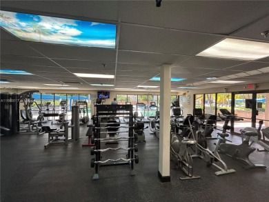 BEAUTIFULLY remodeled 3 bedroom 2 bathroom first floor unit (no on Sunrise Lakes Phase IV Golf Course in Florida - for sale on GolfHomes.com, golf home, golf lot