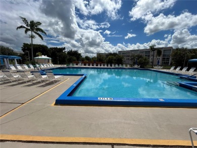 BEAUTIFULLY remodeled 3 bedroom 2 bathroom first floor unit (no on Sunrise Lakes Phase IV Golf Course in Florida - for sale on GolfHomes.com, golf home, golf lot