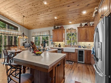 This beautifully furnished home, perfect for immediate enjoyment on Whitehawk Ranch Golf Club in California - for sale on GolfHomes.com, golf home, golf lot