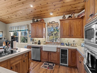 This beautifully furnished home, perfect for immediate enjoyment on Whitehawk Ranch Golf Club in California - for sale on GolfHomes.com, golf home, golf lot