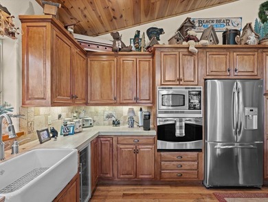 This beautifully furnished home, perfect for immediate enjoyment on Whitehawk Ranch Golf Club in California - for sale on GolfHomes.com, golf home, golf lot