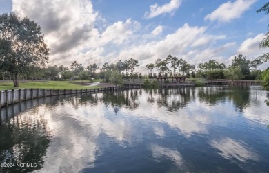 Welcome to a truly exceptional living experience in beautiful St on Founders Club At St. James Plantation in North Carolina - for sale on GolfHomes.com, golf home, golf lot