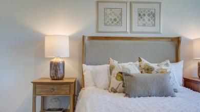 This two-story plan boasts a luxurious primary bedroom upstairs on Shannon Greens Golf Course in South Carolina - for sale on GolfHomes.com, golf home, golf lot