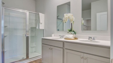 This two-story plan boasts a luxurious primary bedroom upstairs on Shannon Greens Golf Course in South Carolina - for sale on GolfHomes.com, golf home, golf lot
