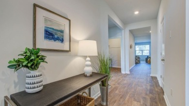 This two-story plan boasts a luxurious primary bedroom upstairs on Shannon Greens Golf Course in South Carolina - for sale on GolfHomes.com, golf home, golf lot