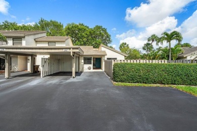 Discover this rare corner villa in the highly sought-after Deer on Deer Creek Golf Club in Florida - for sale on GolfHomes.com, golf home, golf lot
