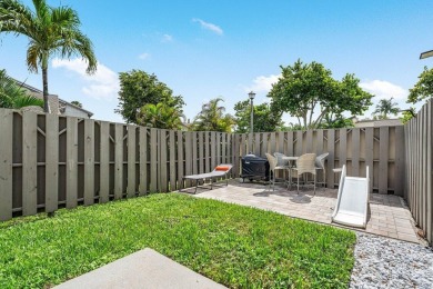 Discover this rare corner villa in the highly sought-after Deer on Deer Creek Golf Club in Florida - for sale on GolfHomes.com, golf home, golf lot