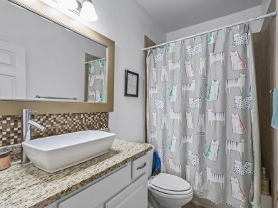 Welcome to this beautifully maintained 3-bedroom, 2-bathroom on Wildwood Country Club in Florida - for sale on GolfHomes.com, golf home, golf lot