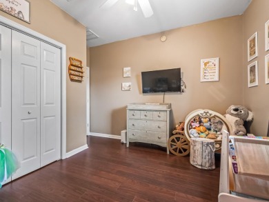 Welcome to this beautifully maintained 3-bedroom, 2-bathroom on Wildwood Country Club in Florida - for sale on GolfHomes.com, golf home, golf lot