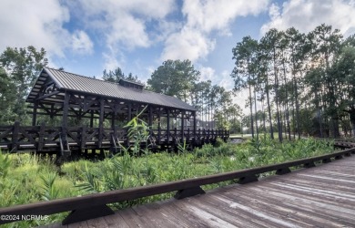 Welcome to a truly exceptional living experience in beautiful St on Founders Club At St. James Plantation in North Carolina - for sale on GolfHomes.com, golf home, golf lot