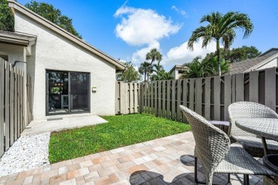Discover this rare corner villa in the highly sought-after Deer on Deer Creek Golf Club in Florida - for sale on GolfHomes.com, golf home, golf lot