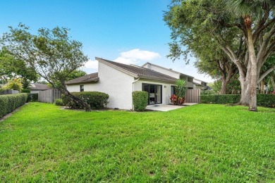 Discover this rare corner villa in the highly sought-after Deer on Deer Creek Golf Club in Florida - for sale on GolfHomes.com, golf home, golf lot