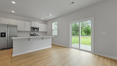 This two-story plan boasts a luxurious primary bedroom upstairs on Shannon Greens Golf Course in South Carolina - for sale on GolfHomes.com, golf home, golf lot