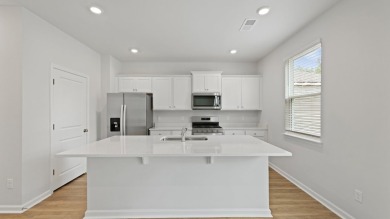 This two-story plan boasts a luxurious primary bedroom upstairs on Shannon Greens Golf Course in South Carolina - for sale on GolfHomes.com, golf home, golf lot