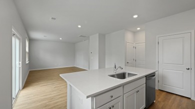 This two-story plan boasts a luxurious primary bedroom upstairs on Shannon Greens Golf Course in South Carolina - for sale on GolfHomes.com, golf home, golf lot