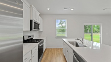 This two-story plan boasts a luxurious primary bedroom upstairs on Shannon Greens Golf Course in South Carolina - for sale on GolfHomes.com, golf home, golf lot