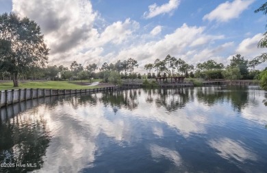 Welcome to a truly exceptional living experience in beautiful St on Founders Club At St. James Plantation in North Carolina - for sale on GolfHomes.com, golf home, golf lot
