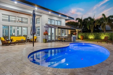 A Masterpiece of Modern Luxury and Timeless EleganceThis on Atlantis Golf Club in Florida - for sale on GolfHomes.com, golf home, golf lot