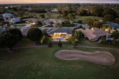 A Masterpiece of Modern Luxury and Timeless EleganceThis on Atlantis Golf Club in Florida - for sale on GolfHomes.com, golf home, golf lot