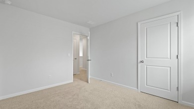 This two-story plan boasts a luxurious primary bedroom upstairs on Shannon Greens Golf Course in South Carolina - for sale on GolfHomes.com, golf home, golf lot