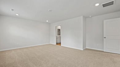 This two-story plan boasts a luxurious primary bedroom upstairs on Shannon Greens Golf Course in South Carolina - for sale on GolfHomes.com, golf home, golf lot