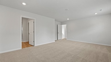 This two-story plan boasts a luxurious primary bedroom upstairs on Shannon Greens Golf Course in South Carolina - for sale on GolfHomes.com, golf home, golf lot