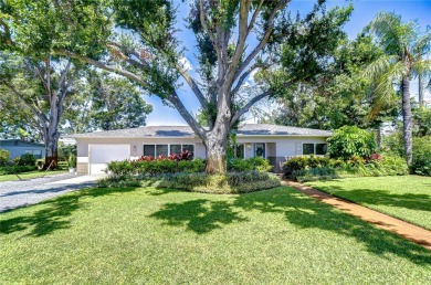 Charming Mid-Century Home on a Spacious Corner Lot in Pasadena on Pasadena Yacht and Country Club in Florida - for sale on GolfHomes.com, golf home, golf lot