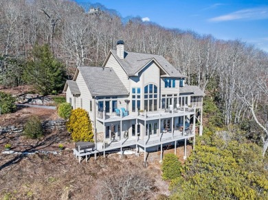 Perched atop one of the most coveted locations in Lake Toxaway on Lake Toxaway Country Club in North Carolina - for sale on GolfHomes.com, golf home, golf lot