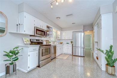 Charming Mid-Century Home on a Spacious Corner Lot in Pasadena on Pasadena Yacht and Country Club in Florida - for sale on GolfHomes.com, golf home, golf lot