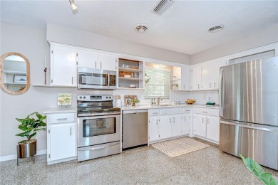 Charming Mid-Century Home on a Spacious Corner Lot in Pasadena on Pasadena Yacht and Country Club in Florida - for sale on GolfHomes.com, golf home, golf lot