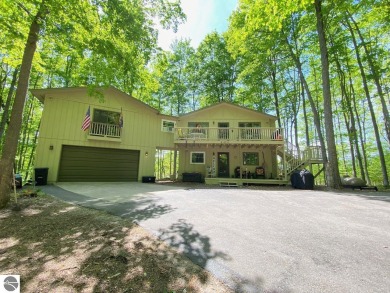 This inviting chalet is at Schuss Mountain, one of the Shanty on Schuss Mountain Golf Club in Michigan - for sale on GolfHomes.com, golf home, golf lot