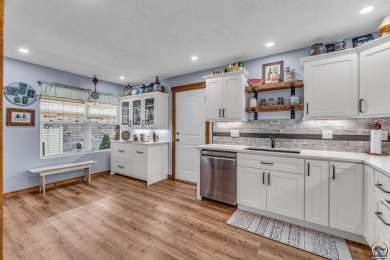 More than a townhome!... A smart, low-maintenance lifestyle near on Lake Shawnee Golf Course in Kansas - for sale on GolfHomes.com, golf home, golf lot