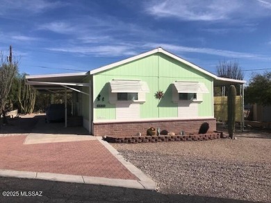 Newer 1996 3 bedroom 2 bath Cavco home on a quiet street with on Tucson Estates Golf Course in Arizona - for sale on GolfHomes.com, golf home, golf lot