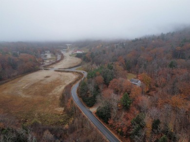 Explore the possibilities with this stunning 5-acre wooded lot on Crotched Mountain Golf Club in New Hampshire - for sale on GolfHomes.com, golf home, golf lot