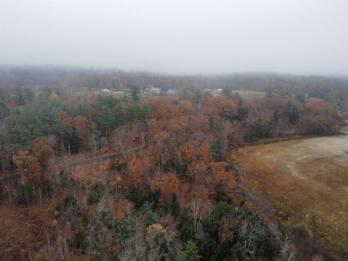 Explore the possibilities with this stunning 5-acre wooded lot on Crotched Mountain Golf Club in New Hampshire - for sale on GolfHomes.com, golf home, golf lot