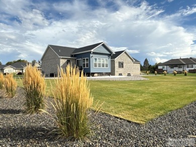 Spiral piers are the focal point of the double door grand entry on Teton Lakes Golf Courses in Idaho - for sale on GolfHomes.com, golf home, golf lot