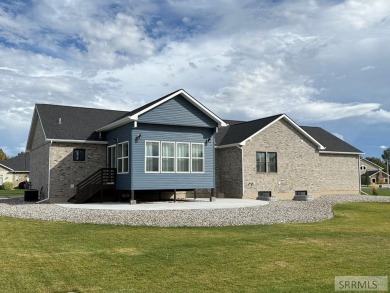 Spiral piers are the focal point of the double door grand entry on Teton Lakes Golf Courses in Idaho - for sale on GolfHomes.com, golf home, golf lot