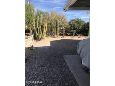 Newer 1996 3 bedroom 2 bath Cavco home on a quiet street with on Tucson Estates Golf Course in Arizona - for sale on GolfHomes.com, golf home, golf lot