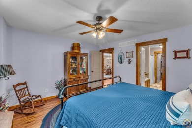 More than a townhome!... A smart, low-maintenance lifestyle near on Lake Shawnee Golf Course in Kansas - for sale on GolfHomes.com, golf home, golf lot