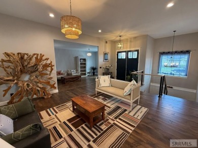 Spiral piers are the focal point of the double door grand entry on Teton Lakes Golf Courses in Idaho - for sale on GolfHomes.com, golf home, golf lot