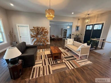 Spiral piers are the focal point of the double door grand entry on Teton Lakes Golf Courses in Idaho - for sale on GolfHomes.com, golf home, golf lot